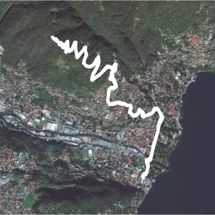 Cross of man walking route map in Como