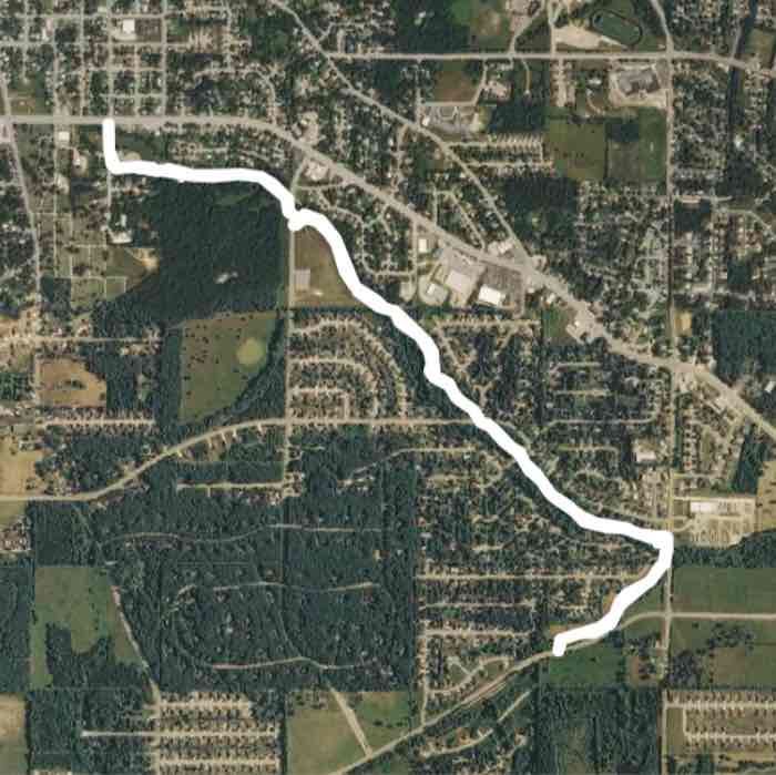 Woman walking route map in Rolla